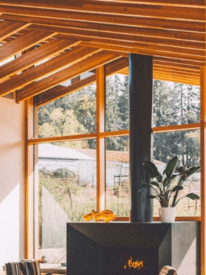véranda à ossature bois : extension de maison chaleureuse